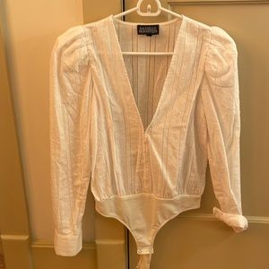 Danielle Bernstein for Macys white body suit. Puffy sleeves